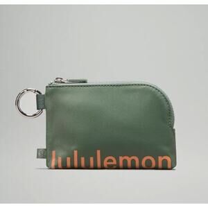 Lululemon Clippable Card Pouch Eucalyptus Green and Coral Orange